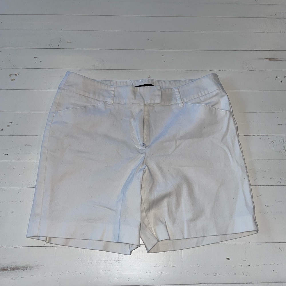 1 pair of White Bermuda Shorts $20